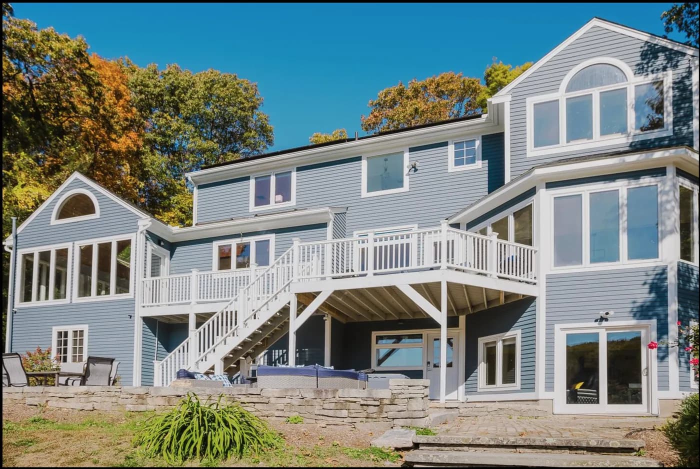 The ceremony house in Haddam, Connecticut, framed by autumn trees